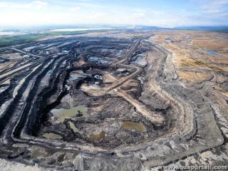 Photo de sables bitumineux et ses synonymes. Sables bitumineux exploités en carrière à ciel ouvert